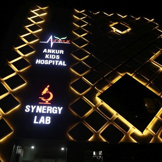 The lit facade of Ankur Kids Hospital