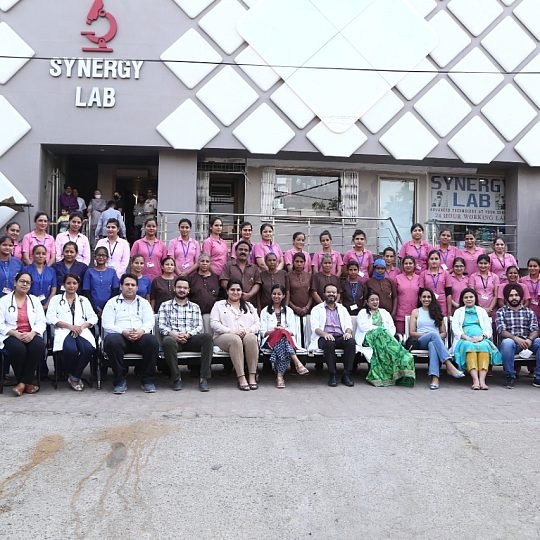 The Ankur family in front of the hospital